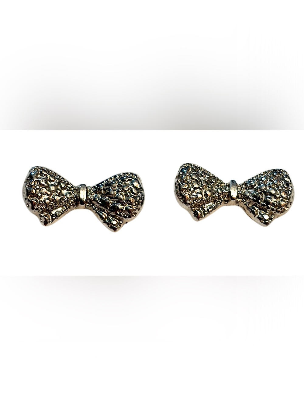 Silver Bow Textured Stud Earrings